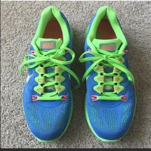 Blue and green Nike shoes